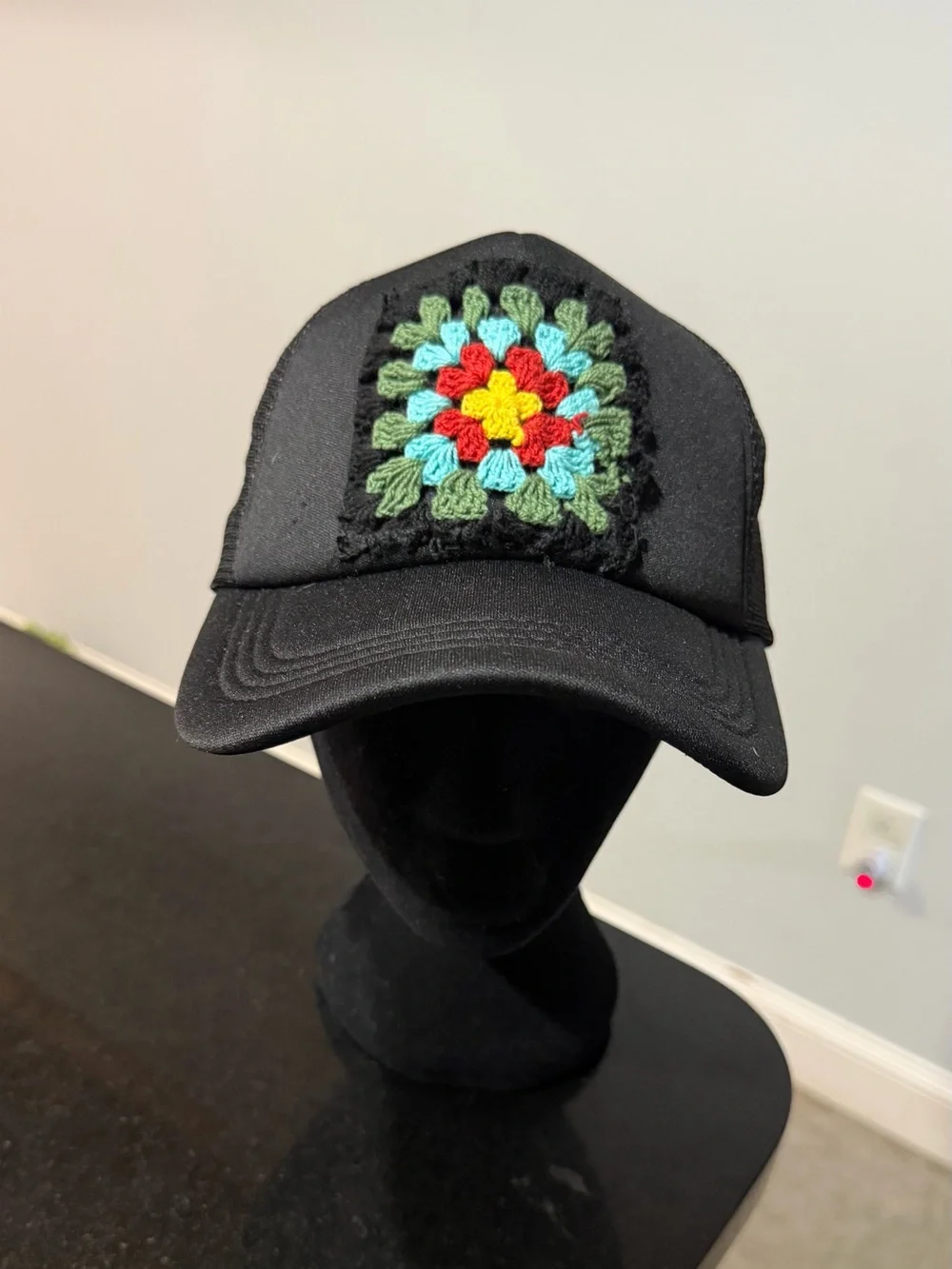 Black Truckers Hat with Crochet Granny Square.